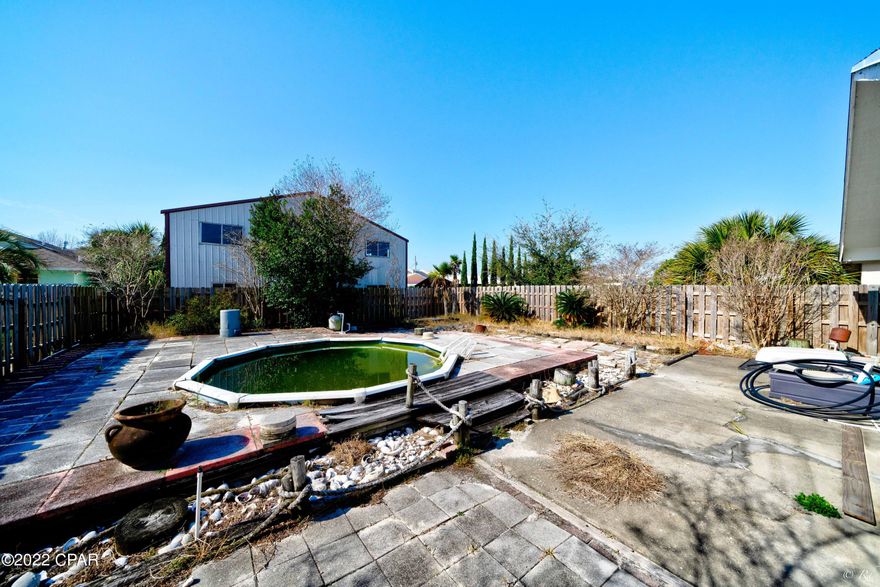 Short-term rental, PCB! Biltmore Beach, East end of Thomas Drive, walk to the Gulf! 5411 Pinetree Ave, 2 bedrooms, 2 full bathrooms, fenced-in backyard, room for a pool! New roof in 2019, 4 blocks from the Gulf, 3 blocks from Grand Lagoon, a fantastic place to call home or give it a vacation rental name and make it income producing! Close to restaurants, shops, on a quiet street with ample parking, fireplace and privacy fenced backyard, Come visit today!