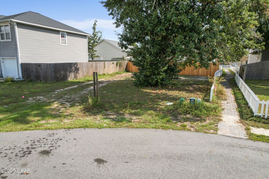 So much potential with this cleared building lot is ready for builders, investors and homeowners, lot is situated at the end of a quiet cul-de-sac with a mature shade tree.   Property is just a  short driving distance to shopping, entertainment, hospitals, doctors, schools, public boat ramps.  All ages, sizes including sq. ft. are approximate measure important.  GO SHOW!