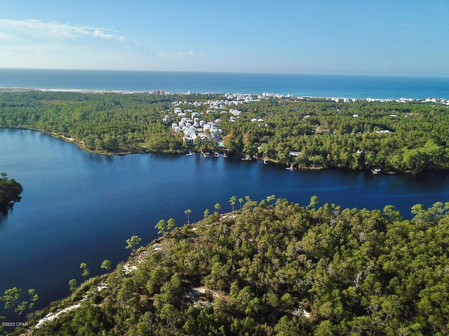 Unbelievable 2.5 acre residential lot with 350' of waterfront. This extraordinary waterfront lot is located on a rare

coastal dune lake, Lake Powell only a short distance to the Gulf of Mexico. This 2.516(+/-) acre lot is the only lot

available on Lake Powell with this amount of acreage and offers the ultimate privacy for waterfront living. There is a

hand-pump shallow well and a 1 bedroom cabin that could be repaired and be your weekend escape or repair and live in the cabin while your waterfront home is being built. This property also has existing pilings for a dock so permitting will be a breeze. This Lake Powell lot is located across the street from Watersound Origins, and just minutes from Highway 30A, Avenues at 30A shopping, and a short boat ride across Lake Powell to the Gulf of Mexico. One of the few lots of this size available with direct water frontage. Don't miss this opportunity to own and build in one of the fastest growing areas in the Panhandle.