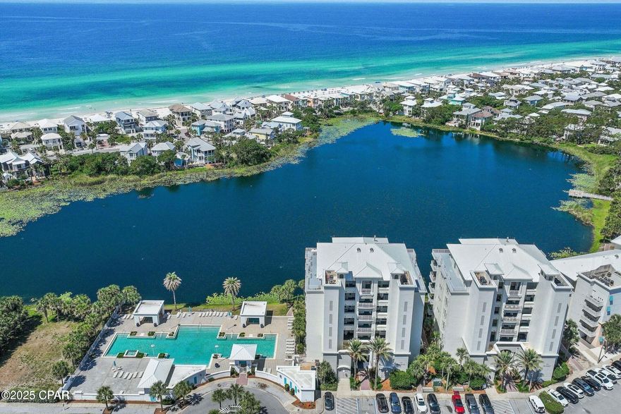 This  waterfront coastal contemporary Penthouse retreat with 4 bedrooms, 4.5 baths and 3,623 sq ft spans the entire top level of a small 7-story, recently renovated condo building. It features a wrap around balcony  with unmatched panoramic views of the Gulf, Lake Carillon and Lake Powell.
It is  located in the charming, vibrant, gated community of Carillon Beach approximately 2 miles East of Rosemary Beach. and 10 minutes from Pier Park.

In addition to the condo pool, the owners of Sunrise and Sunset enjoy all the amenities of
Carillon Beach - four pools, private access to a miile of private, pristine beach, tennis, basketball courts and 8 community walkovers to the beach., The shops and park in the Carillion Town Center are a great place to shop, grab a bite to eat and listen to music.
 
This Penthouse was completely renovated in 2004 with a stunning high-end remodel including new windows. There's an elevator entry into a private foyer to Unit 701.
The open concept living area with high beamed cailing, large great room with gas fireplace, wall of glass doors and windows, and a spacious dining room.
combines the upscale chef's kitchen with island, long breakfast bar and top-of-the-line appliances.

The two Master suites also access the balcony with expansive water views, luxurious baths  with soaking tub and walkin shower and  large walk-in closets. 
There is a guest room with four, full size bunk beds and private bathroom with tub. It 
opens onto the wide balcony offering views of  Lake Powell. 
The second guest room  with balcony access features a large closet and luxurious bath with a walk-in shower.
There is also a powder room and spaciious laundry room with plenty of cabinets.
This Penthouse is a ''one of a kind'! It is the perfect family or corporate retreat or rental investment! It is being sold completely funishing with high end designer furninshings.