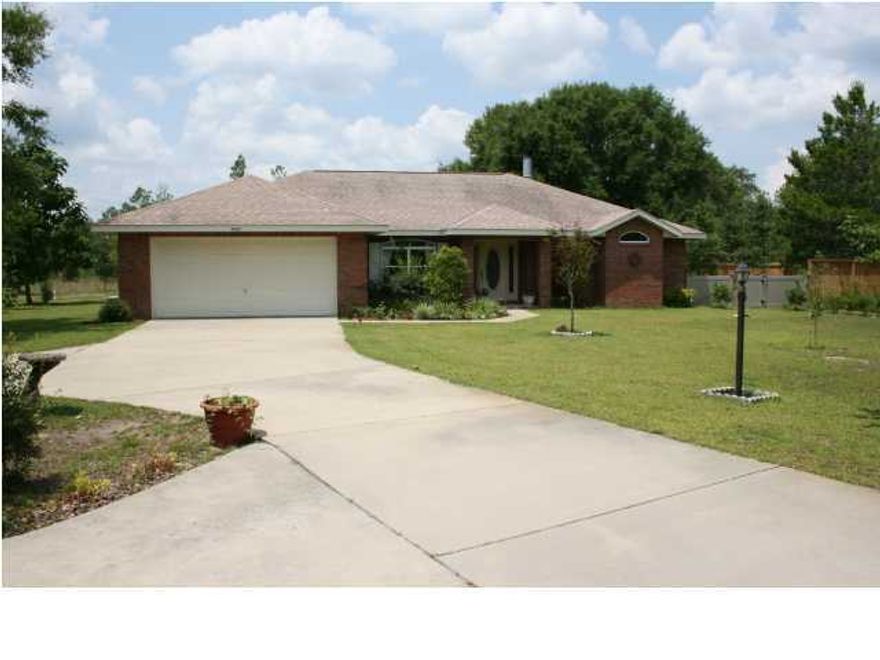 Lovely all brick hom eon 12+/- acres.  Excellent condition home has bonus room, inground pool with screening & brick pavers, attached 2-car garage, central vacuum system, fully equipped kitchen, washer & dryer.  Big detached 2-car garage/workshop.  Property has established pastures for horses, pole barn, fencing and more.  A short walk to the pavilion, Lake Denise and pool.  Equestrian trails border this property.