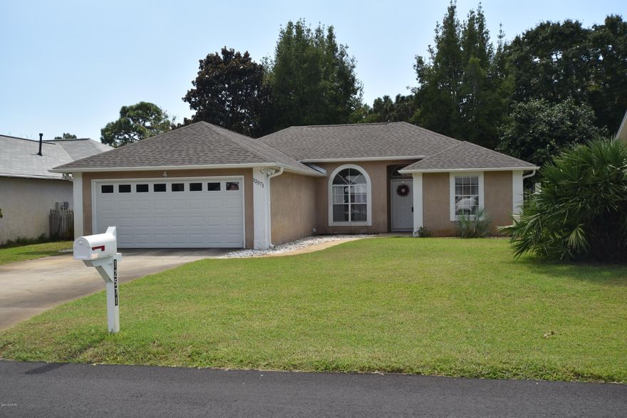 Great home or investment opportunity in Panama City Beach! Public beach and gulf access only 1/2 mile away or watch the sunset on the county pier, less than a mile away. Take a break from the sand and surf, visit one of many restaurants, and do some shopping at Pier Park only minutes away. Centrally located in PCB and in walking distance to some of the best schools in Bay County. This spacious floor plan spans 1300 sqft, featuring 3 bedrooms, 2 full baths, including a heated and cooled office space; or use it as holiday storage. Relax in the comfort of your fenced in back yard or within your screened/covered backporch. This is a great, well kept home, ready for your family, call for your private tour. All measurements are approx., please verify if important. Roof is only 4 years old! Newer appliances come with transferable extended warranty. Home has terminte bond and is also transferable.