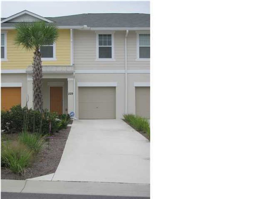 West end of the beach!! Whisper Dunes is a beautiful  community. This is a 3 bedroom 2.5 bathroom townhome with a 1 car garage. The 3 bedrooms are upstairs along with 2 baths. The kitchen, dining and living area are downstairs. The kitchen also offers a breakfast bar.  The home also comes with a full size washer & dryer- that comes AS IS. Built in 2010. Very energy efficient. Very nice community pool and pool deck.  All lawn maintenance  is included. the home is already wired for alarm. Tenants will be responsible for alarm system if you decide to activate.