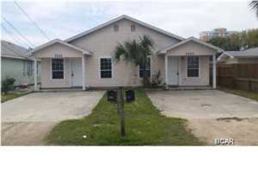 Numbers work with this duplex with 2 bedrooms and 1 bath on each side, rent them out or live on one side and offset expenses with renting the other. Just a short walk to the beach. Contemporary in style split floor plan.