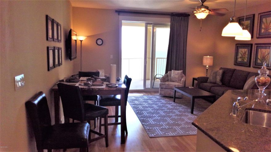 The Grand Panama Beach Resort is one of the most sought after properties along the beach. Centrally located the  resort offers two pools, one heated, hot tub, kiddie pool, Tiki Bar, gas barbeque grills, fitness center and more. This spacious one bedroom two bath offers spectacular gulf views from its private balcony. Appointed with granite countertops, stainless steel appliances, alcove with bunk beds, large shower in the master bath and beautiful tile and wood flooring. With brand new pullout sleeper couch, chairs, bedding and linens this unit sleeps six and is in immaculate condition.Turn key as your beach getaway or has great rental potential with an onsite rental management company that does all the work for you. Just sit back from afar and enjoy monthly checks. More... Just down the road is Pier Park the areas newest premier shopping and dining location. An open air lifestyle center that also features tourist attractions and an outdoor stage for events and concerts.
All information believed to be correct but should be verified by the buyer.