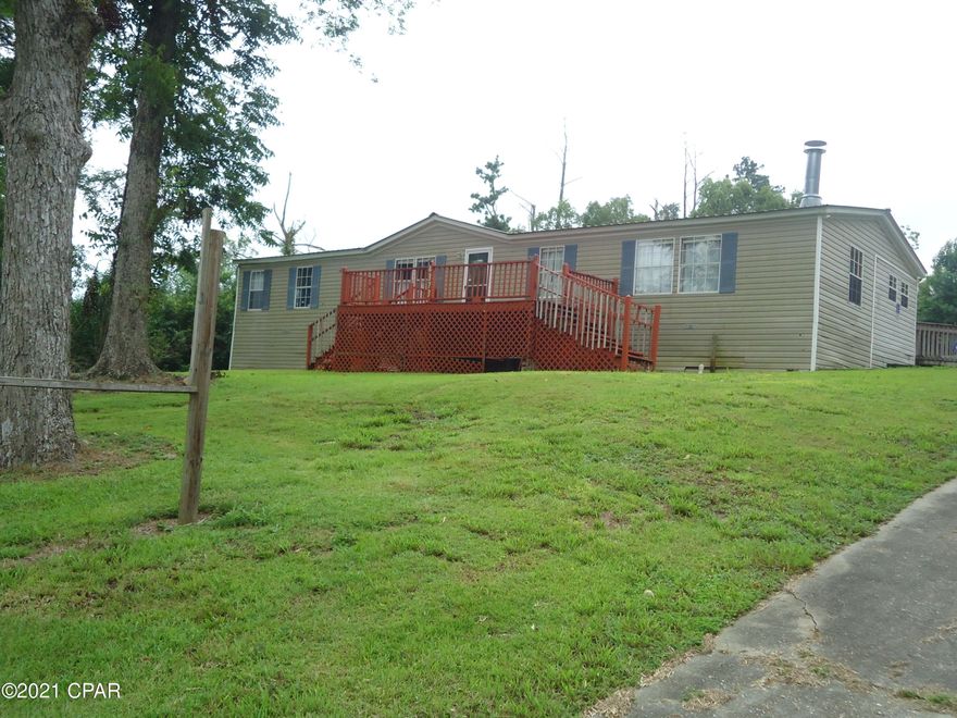 Has been a daycare facility that had 29 children, has a fire alarm, security and small fenced area.  As the rules change check with DCF for codes and rules.  May be re-zoned if needed with the City of Marianna, check with them for that process.  There is a vacant lot adjacent to this so  you could own the whole corner.  If measurements are important then get a contractor to measure for you.