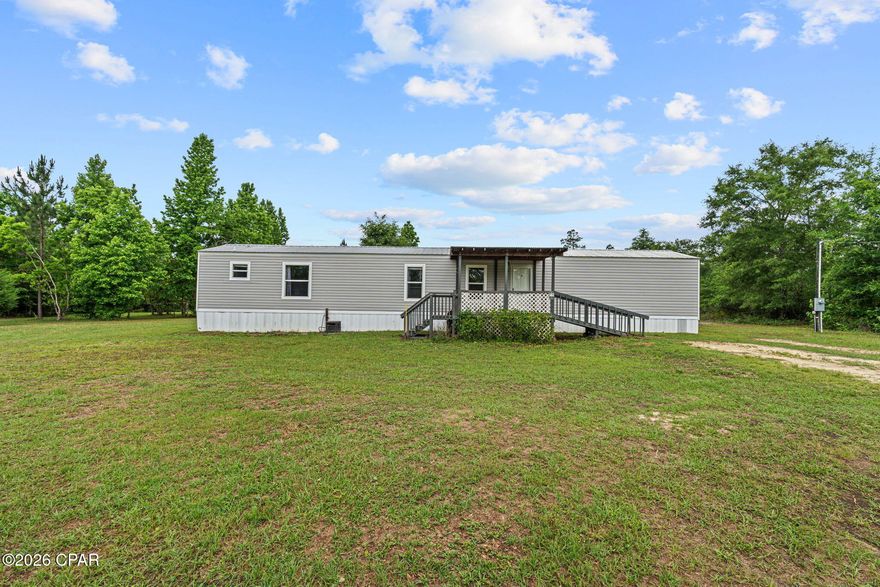 Must See! Over 17 Acres!
Two private ponds, a creek, and room to grow--this is the kind of property you don't come across twice.

This well-maintained 3-bedroom, 2-bath mobile home sits on a unique piece of land that blends privacy, natural beauty, and long-term potential, all while being conveniently located just off Highway 231 for easy access to town.

The property features two private ponds (one stocked with fish) and a natural creek running through, creating a peaceful, scenic setting that's perfect for relaxing, fishing, or simply enjoying the outdoors. With a mix of open space and mature trees, the land offers flexibility for a variety of uses--whether you're looking to spread out, garden, or plan for the future.

The home itself has been very well taken care of and includes a fenced backyard, ideal for pets. You'll also find a shed with electricity, perfect for a workshop or hobby space, along with a large connex container that provides substantial storage for equipment, tools, or business needs.

One of the most valuable features of this property is the oversized septic system, designed to support a larger home. This creates a rare opportunity for buyers considering building, expanding, or creating a multi-generational setup down the road (buyer to verify).

Whether you're looking for a primary residence, a private retreat, or a property with future potential, this one offers a combination of function, flexibility, and natural beauty that's hard to find.