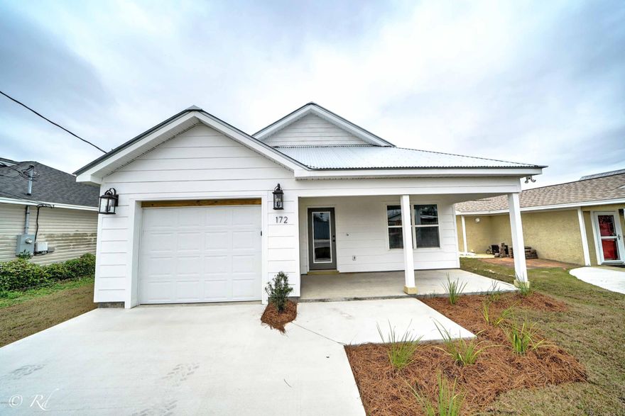 Cozy beach home with all the touches you want at the beach! This home is 3 bed 2 bath new construction, close to the beach, metal Roof, beautiful fixtures, home is in the heart of Panama City Beach and won't last long. It is still under construction but is expected to be finished on March 1.