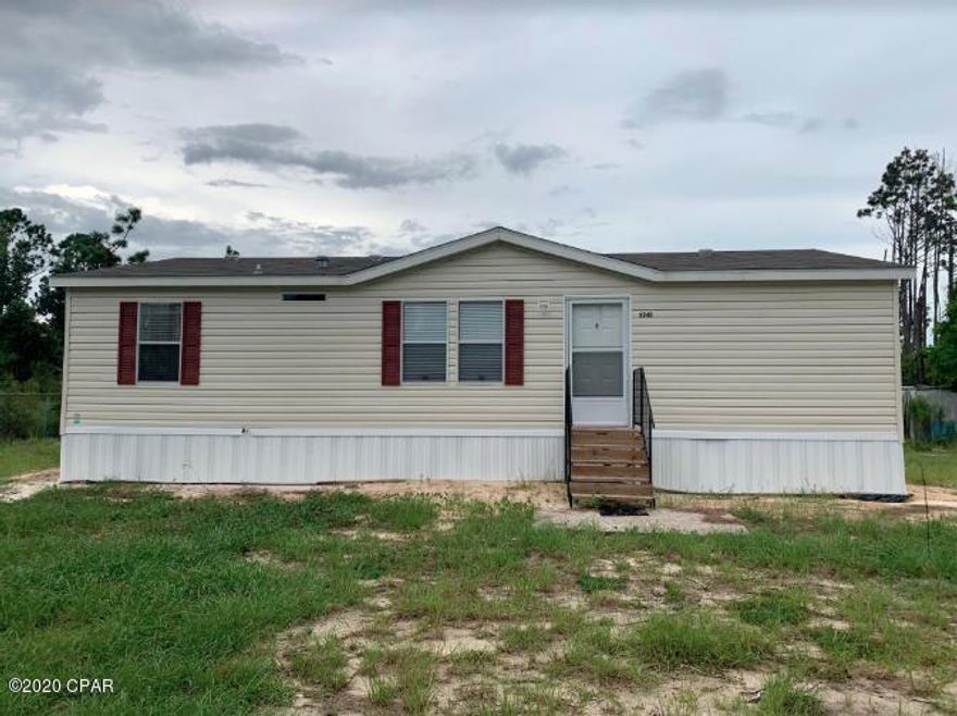 New 3 bedroom 2 bath mobile home on almost an entire acre. New septic system as well! Enjoy the serenity this location has to offer with the peace of mind of the home coming with a one year warranty. The home comes with all the furnishings and decorations pictured as well. This home is a 2017 model but was used as the model home and has never been lived in. Just 20 to 30 minutes from Panama City/Lynn Haven area and convenient to Panama City Beach.