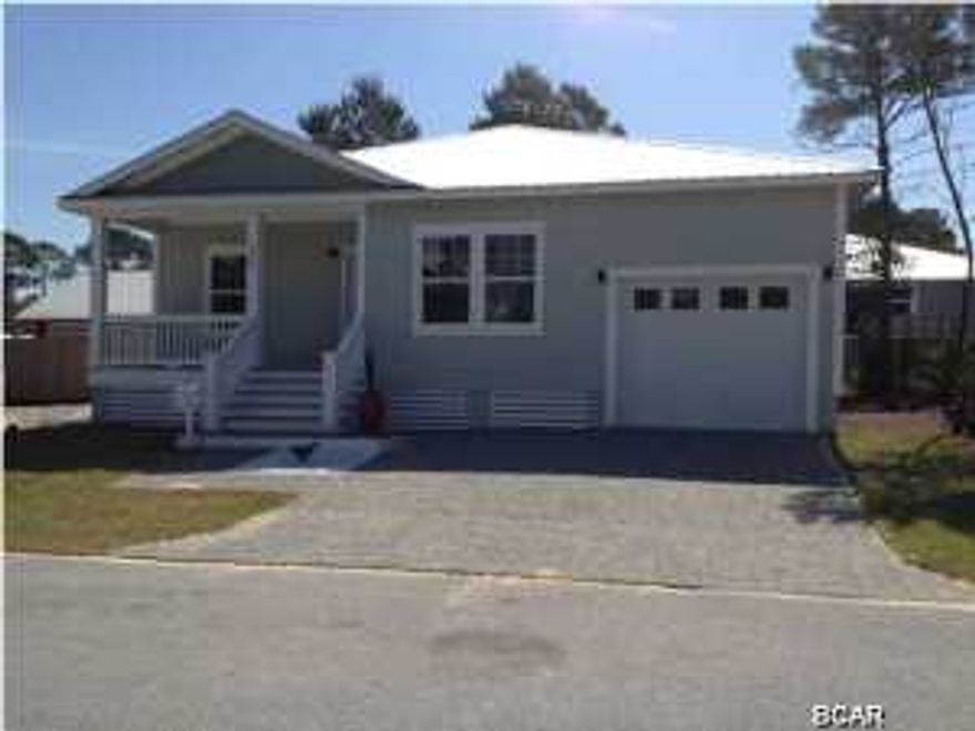 ***READY FOR OCCUPANCY....BRAND NEW PARADISE GROVE HOME*** Features include hardwood floors,granite countertops, stainless steel appliances, custom lights and plumbing fixtures, custom bathrooms, outside shower, and a one car garage. Paradise Grove is one of only a handful of gated communities in Panama City Beach. The community offers a resort style pool, pet walk areas, decorative street lamps, and you are less than 5 minutes away from the beach...and just a few minutes more from Pier Park! All info is approx. and should be verified by buyers if important.