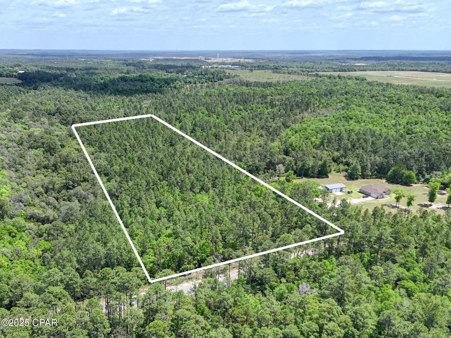 Discover your slice of paradise on this pristine 10-acre wooded lot in DeFuniak Springs! Mother Nature has been busy crafting this peaceful haven for years, and now it's ready for you to add your personal touch. Towering pines and majestic hardwoods create a natural cathedral of green, while dappled sunlight filters through the canopy. The only sounds you'll hear are birds, rustling leaves, and perhaps your own sigh of contentment as you wander through your very own forest. This untouched canvas offers endless possibilities - build your dream home nestled among the trees, create winding pathways through your private woodland, or simply enjoy the tranquility that comes with owning your personal nature retreat. Just minutes from town amenities yet worlds away from the hustle and bustle, this property strikes the perfect balance between convenience and seclusion. Just a short drive away, experience the renowned crystal-clear springs of the DeFuniak Springs area, including the historic perfectly round Lake DeFuniak and nearby Morrison Springs with their refreshing waters, adding natural beauty and recreation to complement your woodland sanctuary