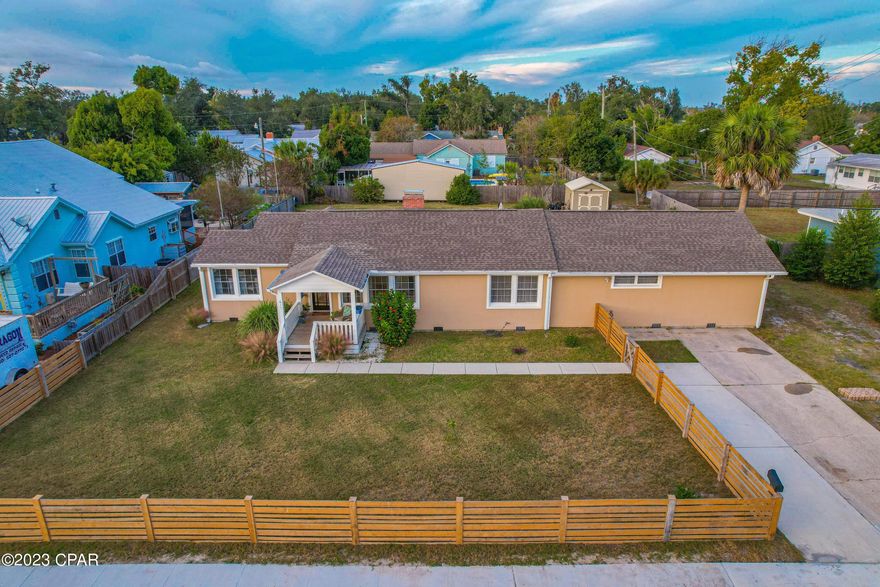 Immaculate and fully remodeled 4 bedrooms, 2.5 bath, 2070 sq ft,  in the highly desirable Bunkers Cove area and ready for you to move in. This home sits on a double lot close to Tyndall A.F.B., restaurants and shopping. As you walk into the elegant foyer/sitting area, you are greeted by custom flooring throughout,thus giving you a  bright and open feel with the surrounding warm neutral colors. The large living room has a wood burning fireplace and spacious area.. The kitchen and eating area incorporates custom cabinetry, stainless steel appliances, quartz counter tops and decorative lighting. Renovations include new roof, updated plumbing and electrical, a new 2022 air conditioner,  furnace, and water heater. You have  new exterior and interior painting throughout and, new flooring.   The  fourth bedroom with the barn door, can easily be used as an office or craftsmanship room.  It has built in cabinets and next to the 1/2 bath that has been fully remodeled.  You have split bedrooms with the master bedroom being extremely large (20 x 24),and 3 closet areas.  This master can easily accommodate an office or if you do not need such a large master; you can covert it to a Family Bonus room.  The elegance of the master bath is above and beyond with a custom shower, soaking tub, and dual vanity.  The two additional  bedrooms are on the other side of the home for additional privacy and  both share another remodeled full bathroom.  You have a separate laundry room with plenty of spacious area. The exterior of the home has a large custom deck that was added on in 2022.  There is an additional  entrance in the rear (two entrances) of the double lot. Quality schools and Hospitals near vicinity such as Holly Nativity, Cherry Street and Bay Medical Center. Neighborhood is quiet and Golf Cart friendly.   Schedule your private tour today of this fabulous and charming home.