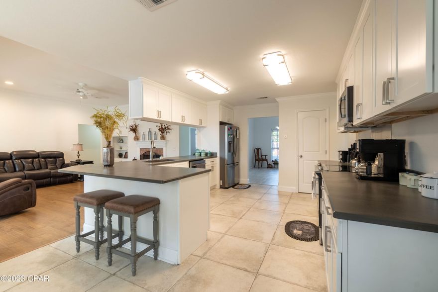 Lynn Haven Mill Bayou:  Beautiful All Brick 4-bedroom home with 2.5 Baths is move in ready and qualifies for Zero Downpayment loans.  Remodeled and ready for a new owner.  Come see this home nestled in one of the most desired locations, just minutes from everywhere but out of the way for privacy.  Lynn Haven owns and manages 10 public parks and offers a variety of activities year around.  Come check out this home that offers Impeccably clean appearance that  appears like new and includes New Luxury Vinyl Plank Flooring 2022, New Roof 2019, New Pool liner 2022, New stainless steel Refrigerator w/ Ice on Door (2022), New stainless Dishwasher (2022), Pool Privacy fenced enclosed for safety, She Shed with electric/lights, New Front Wood Door (2022). Lots to enjoy and plenty to appreciate in this solid all brick home in a golf cart friendly neighborhood just down the road from Lynn Haven Sports Complex and Nature Walk Golf Club. All info & measurements are approx., buyer to verify all deemed important. Call today for your private showing and see for yourself how spotless this home is and how perfect it may be for you.