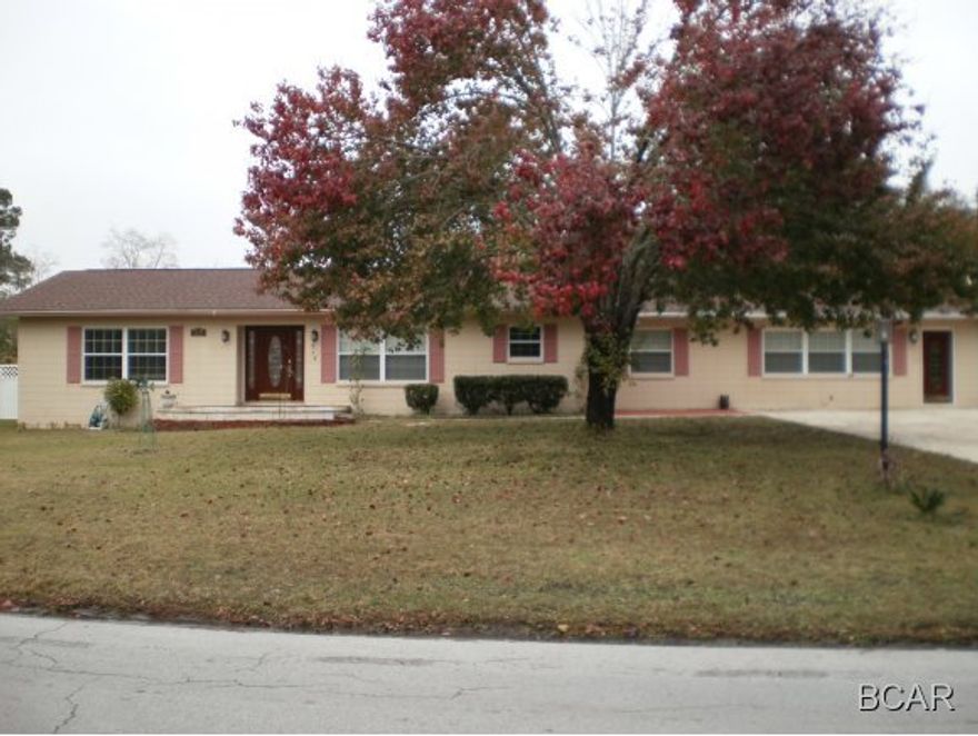 Home located just minutes from Tyndall AFB. This large home has a luxury kitchen which includes a lazy Susan, updated appliances, a large amount of cabinet and storage space, and a breakfast bar. Two living spaces, a fireplace, a formal dining area, hardwood floors, updated fixtures and lights all make this home a must see. There is also a fenced in back yard which is accessible from the screened in Florida room and a separate garage that can also be used for storage.