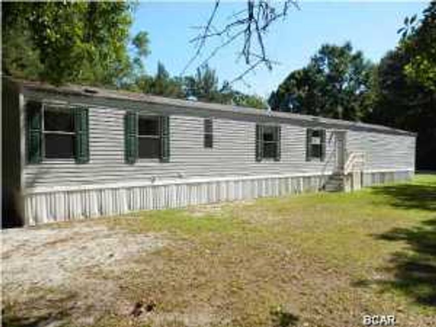 Crisp and clean doublewide offers a nice layout that includes a formal living room, split-planned bedrooms, eat-in kitchen w/all appliances, utility mudroom, and a spacious master suite w/dual closets and master bath that offers a garden tub and separate shower! Charming downtown location offering excellent proximity to Dead Lakes Park for terrific fishing, hiking, boating, camping, and nature viewing!