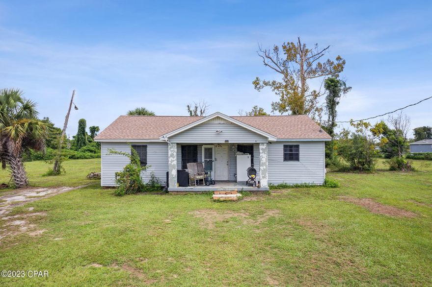 Nestled within the city limits, this property presents a unique blend of potential and possibilities. With 3 bedrooms and 1 bathroom, this home is ready for your personal touch and a bit of tender loving care to transform it into your dream residence.

One of the standout features of this property is its potential for lot division. The 1.81 acres can be subdivided into three separate lots, creating an opportunity to build additional homes on each side. This potential expansion offers not only room for growth but also an exciting investment avenue.

Recent upgrades include a new roof installed in 2019 and new insulation, ensuring improved energy efficiency and protection against the elements.

Conveniently located just 15 minutes from Tyndall Air Force Base and a short 30-minute drive from the world's most beautiful beaches, this property combines city living with easy access to coastal beauty.

Whether you want to renovate the existing home or explore the potential for expansion, this property is your canvas for limitless possibilities. Contact me today to seize the opportunities that await. (Note: Property condition and lot division potential are subject to local regulations and approvals.)