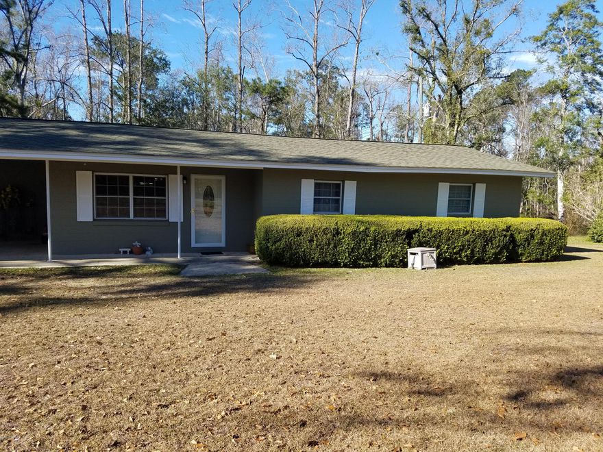 CURRENTLY UNDER CONTRACT, SELLER ACCEPTING BACKUP OFFERS!!  MOTIVATED SELLER UNDER THE OLD OAK TREES! This 3/2 Block home is located on 2.28 acres featuring big oak trees, just outside of Chattahoochee.  Come see this 3 bedroom 2 bath home with a back/vinyl screened in porch for morning coffee, 2 storage buildings, 3 car carport with windows, mostly leveled yard, private well, private septic, highway frontage, central heating and cooling, all appliances electric, washer and dryer hookup enclosed area.  BRING ALL OFFERS.  Call Listing Agent to schedule your appointment TODAY!!
