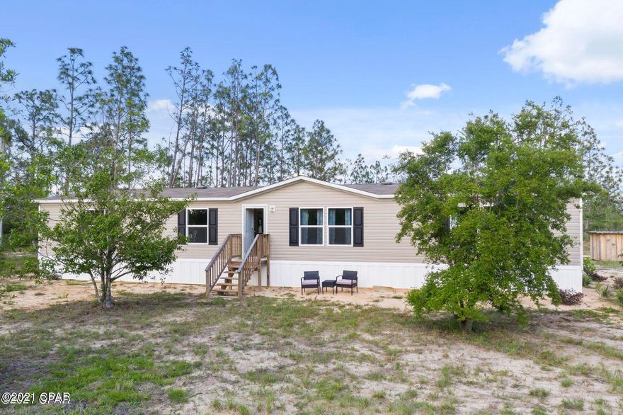 CURRENTLY UNDER CONTRACT, SELLER ACCEPTING BACKUP OFFERS. Secluded Mini Farm with LIKE NEW home awaits you. This beautiful property features a spacious home with a split floor plan, open concept, and a large walk-in closet in the master bath. Bring your horses as it already has the perfect setup with a very large barn with two stalls, water and two completely fenced pastures for your horses. Watch the sunset from your front yard as home as been perfectly situated for your enjoyment.  Home has a current survey.  Sellers are moving due to health problems and age.