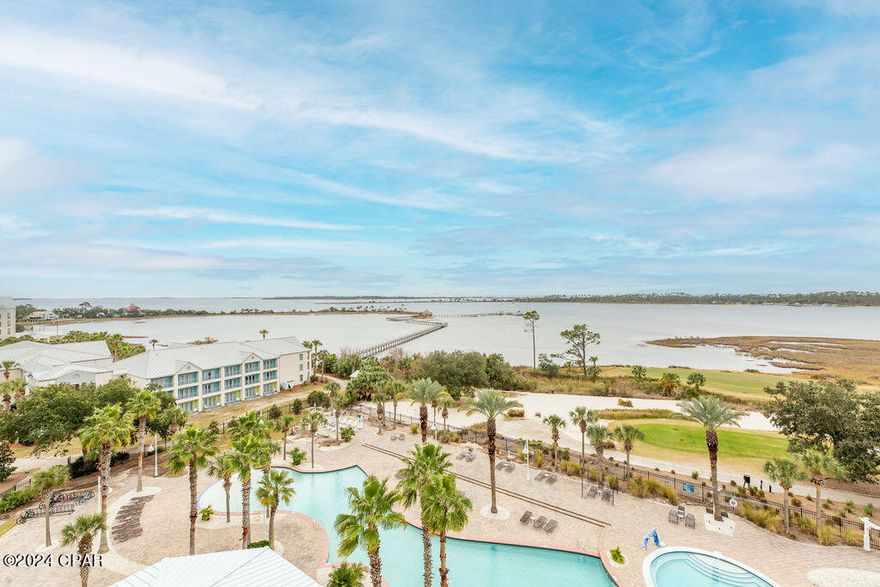 ***CURRENTLY UNDER CONTRACT, SELLER WILL CONSIDER BACKUP OFFERS*** Higher floor = Spectacular views of the pool, Bay, Gulf and beyond!! Reflections At Bay Pointe is a wonderful place to live full time or these units can be short term rented!  This two bedroom unit is ready for a new owner with fresh paint throughout, luxury vinyl plank flooring, granite counters, and recently replaced AC and water heater! Reflections boasts a lagoon style pool, Heated Pool, Hot Tub, fire pits, outdoor grills, workout room and owner's lounge. Additionally, Serenity Spa is directly on site at the bottom floor and offers full spa services to owners and guests! Close to restaurants, entertainment, and shopping in both Panama City Beach and Panama City, this is a great location to enjoy the beach lifestyle. Schedule your showing today!