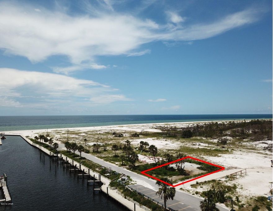 This is one of the best lots in Mexico Beach. Located on the beachside of Hwy 98 on Canal Parkway where you can rent a boat slip from the City of Mexico Beach and have a beachside home with a boat slip at a fraction of what lots with private boat slips are going for across the canal. This lot has amazing views in 3 directions and the beach steps away is pet friendly. This lot is behind the CCCL line so you don't have to deal with the time and expense required with a DEP permit. There was a home on lot, so tap fees are included with the lot. The majority of this lot is in the X/0.02 zone.