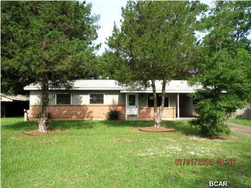 GREAT HOUSE AT AN AFFORDABLE PRICE! This home features ceramic tile throughout the living room, kitchen and additional den that was added to the back of the home. The updated kitchen has light oak cabinets with an attractive tile backsplash, and the full bath has also had tile updates. Situated on a large lot, the home as a covered patio and a carport. Home being sold in its AS IS condition.