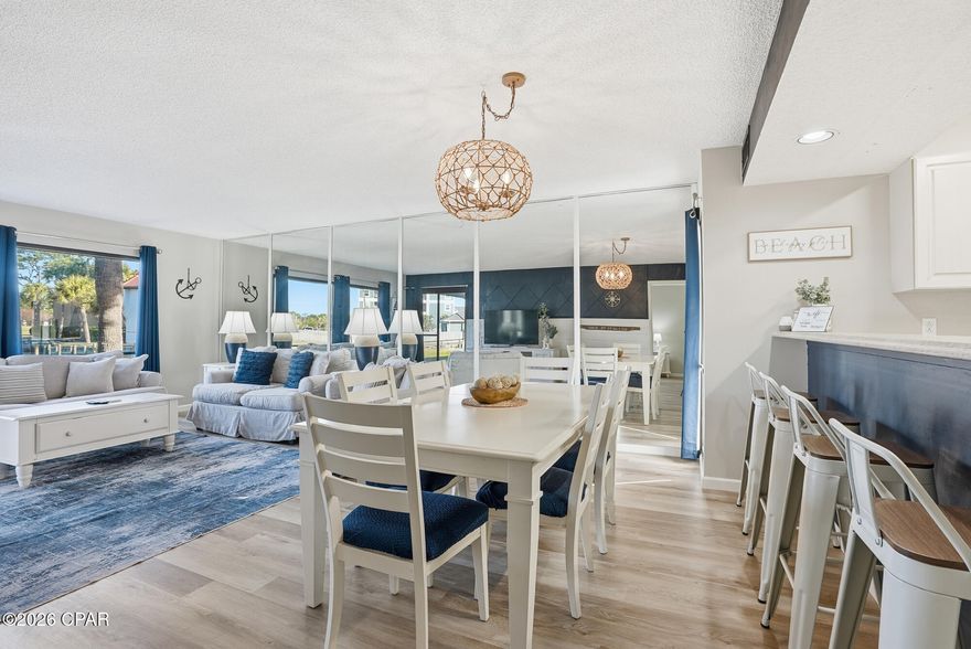 Wake up to water views, walk straight out your door, and be on the beach in minutes — this is the kind of effortless coastal living buyers come to Panama City Beach for.

Welcome to this fully updated ground-floor 2-bedroom, 2-bath condo in Edgewater Beach & Golf Resort, where privacy, nature, and resort lifestyle come together in one of the most desirable locations in the community. Tucked along a peaceful pond surrounded by mature trees and green space, this unit offers a rare tranquil setting while still being just a short 5-minute walk (or quick tram ride) to the beach.

Inside, the recent upgrades make this condo feel bright, open, and move-in ready. The drop ceiling has been removed for a more spacious feel, and brand-new LVP flooring runs throughout for a clean, modern coastal look that's also durable and low maintenance. Fresh paint, new trim, updated cabinet hardware, stone-look laminate countertops, a new sink, all new faucets, and brand-new appliances give the kitchen a refreshed, contemporary feel that appeals to both owners and guests.

The open living and dining area flows seamlessly to panoramic patio doors leading to a covered patio overlooking the serene pond — the perfect spot for morning coffee, evening unwinding, or simply enjoying the peaceful natural backdrop. The ground-floor location means no stairs or elevators, with parking right outside your door for unmatched convenience.

The 2-bedroom layout offers excellent flexibility for personal use or rental guests, and the in-unit washer and dryer add everyday practicality that visitors and owners appreciate.

Edgewater Beach & Golf Resort is known for its unmatched amenities and prime location. Owners and guests enjoy multiple pools including a spectacular oceanfront lagoon-style pool, hot tubs, beach access, tram service throughout the resort, fitness center, tennis, pickleball, golf, on-site dining, and beautifully maintained grounds. The community's layout offers the best of both worlds — a peaceful villa setting with easy access to the beachfront action.

Whether you're looking for a second home, a winter retreat, or a vacation rental property in a high-demand resort, this condo checks the boxes for lifestyle, location, and long-term appeal. With its updated interior, ground-floor convenience, and serene water view setting, this is a standout opportunity within Edgewater.

Schedule your showing and experience the difference this location and renovation make.