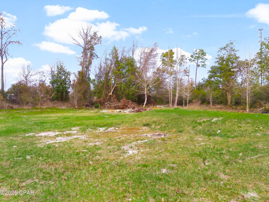 Discover the perfect blend of tranquility and convenience with this beautiful 1-acre vacant lot at 9320 Pat Rd, Youngstown, FL. Nestled in a peaceful setting, this property offers a fantastic opportunity to build your dream home. Enjoy the added charm of your own private pond, creating a picturesque backdrop for your future home.

Located between Camp Flowers Road and Highway 2301, outdoor enthusiasts will love the proximity to Bayou George Park & Athletic Complex and easy access to Deerpoint Lake, with a boat ramp just four miles away. Plus, Panama City Beach is only an hour's drive!

While there are no active utilities on-site, electric is available at the street, and there is already a septic tank and well on the property. The septic system was previously connected to a home, and the well has not been used in years.