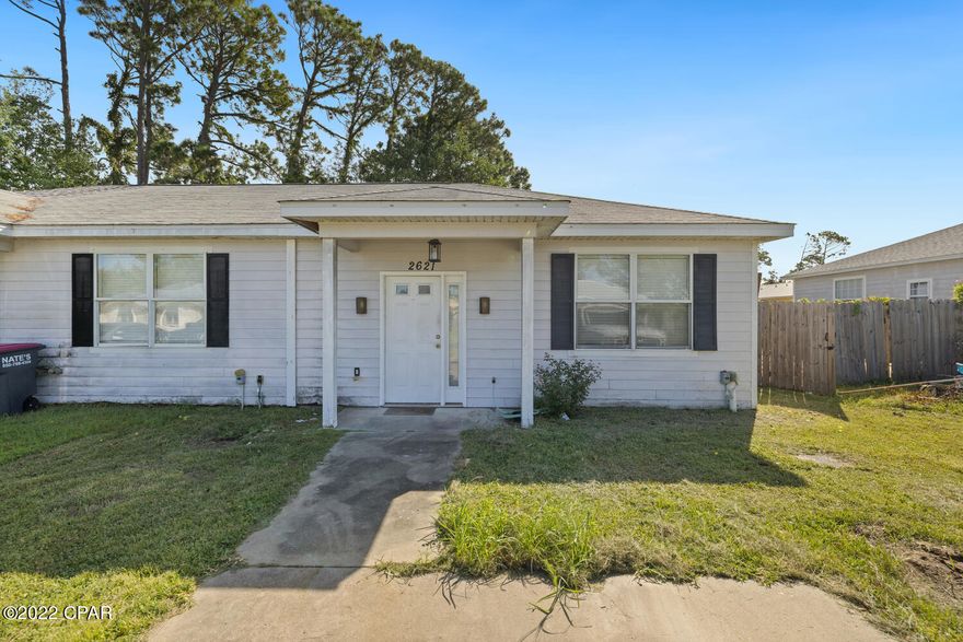 CURRENTLY UNDER CONTRACT, SELLER WILL CONSIDER BACKUP OFFERS. This affordable 2 bedroom, 2 bathroom townhome is a must see! This open floor plan provides plenty of living space and a large fenced yard. You'll enjoy the location of this home close to schools, shopping, dining and the beautiful beaches. The kitchen with updated tile back splash also provides a side entry door, a spacious pantry and a breakfast bar. The home also provides a formal dining room that flows into the living room. The master bedroom has a private master bathroom with updated tile floors. The additional room also provides plenty of space for sleep and study with its own bathroom. If you're looking to live on the beach for a great price this home is a must see!