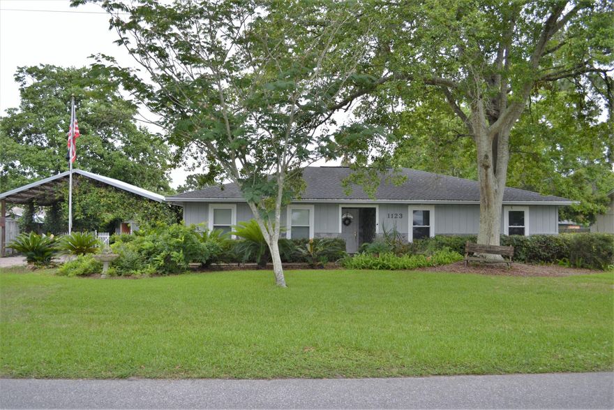 GREAT HOME WITH IN-GROUND POOL NEAR TYNDALL AFB! The interior features 3 bedrooms, 2 full baths, a large living room, crown molding, an updated kitchen (all appliances convey) and a one car garage with additional workshop space. The eat-in-kitchen has granite counter-tops, stainless steel appliances, a pantry with pull out drawers and windows overlooking the pool. The master bedroom can accommodate king size furniture and has an adjoining bath with stand-up shower. The other 2 bedrooms are good size and share a hall bath with shower/tub combo. The exterior features a 24x18 pole barn style carport, a paver driveway, a greenhouse/workshop, a Hot Tub (not warranted), and a fenced backyard. All information derived from owner and public record. Measurements approximate.