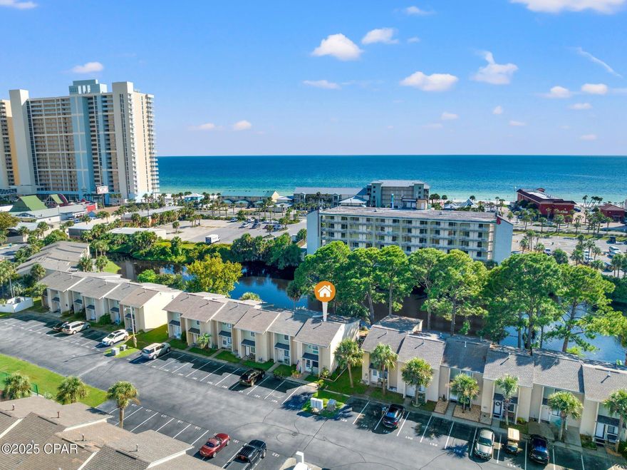 This is a rare Water-Front Gem boasting Breathtaking Views! It features 3 bedrooms, 3.5 bathrooms, plus a bonus room downstairs. It stands out as one of the largest and nearest units to the beach, offering stunning views of the canal from the master bedroom, kitchen, and sunroom. Search the address on YouTube for video tour! VA & FHA approved! Fully Updated with quartz waterfall countertop in the kitchen, tiled walk-in showers, LVP flooring, solid wood stairs, new furniture and accessories and so much more. New Roof in 2019, New HVAC in 2021 and New Water Heater in 2020. You will be amazed by the style, location, privacy and the island feel. This charming home is ready to be enjoyed and bring lots of passive income with projected GRI of 48k+ a year! 2 assigned parking in front of the unit. LOW HOA includes: 11 pools(5 heated), shuffleboards, water-front restaurant & pool, mini golf, exercise room, tennis courts, pickleball, playground, WIFI, pest control, termite bond, trash, ground keeping, irrigation, property patrol, gated community etc. This is the ONE! All the info is believed to be correct but all parties must do their own diligence.