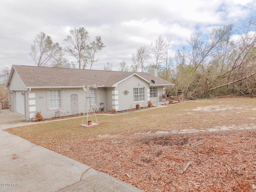 THIS GREAT HOME IS SITUATED JUST MINUTES FROM COMPASS LAKE LODGE! THIS BEAUTIFUL HOME IS CLOSE TO THE LAKE, BOAT RAMP, AND IS ON A PAVED ROAD WITH CONCRETE DRIVE ENTRANCE. HOME OFFERS REMARKABLE GARAGE AS WELL AS A SCREENED IN BACK PORCH!  NEW ROOF IN 2017 AND COMPLETELY UPDATED IN 2018! NEW FLOORING, PAINT, LIGHT FIXTURES, COUNTER TOPS AND APPLIANCES! THIS JEWEL IS ALSO EQUIPPED WITH A GAS LOG FIREPLACE TO KEEP YOU COZY! HOME IS SPOTLESS AND READY TO GO! HURRY THIS ONE WON'T LAST LONG!