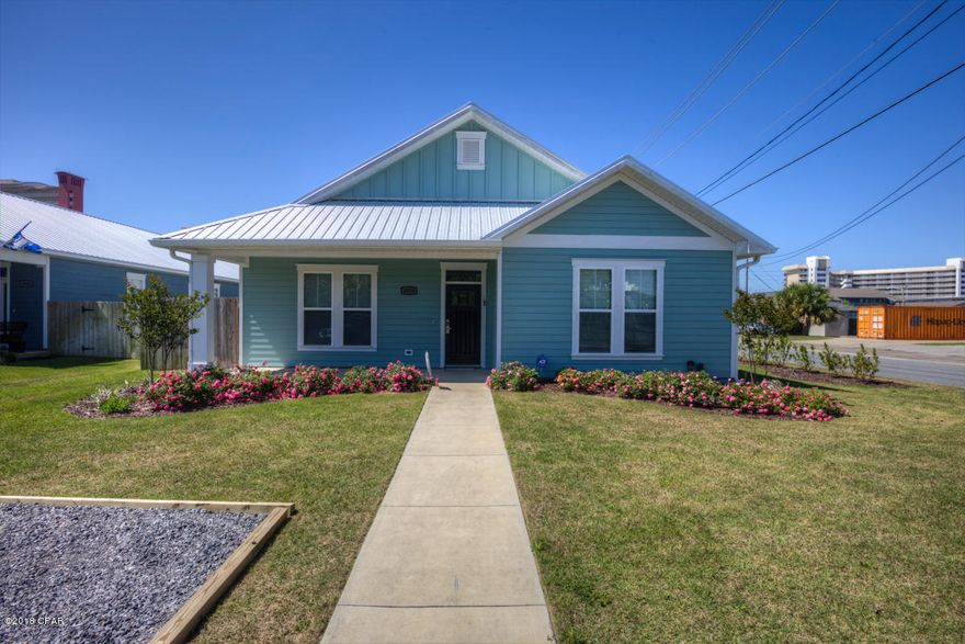 This Beach house is just a couple of blocks from the beach. It is currently being used as a beach rental.It is being sold un furnished. It is move in ready. Privacy fenced back yard and covered porch for your out door enjoyment. Stainless appliances, breakfast bar, split bedroom plan, attached garage, no carpet to worry with. It would be a great primary residence as well.