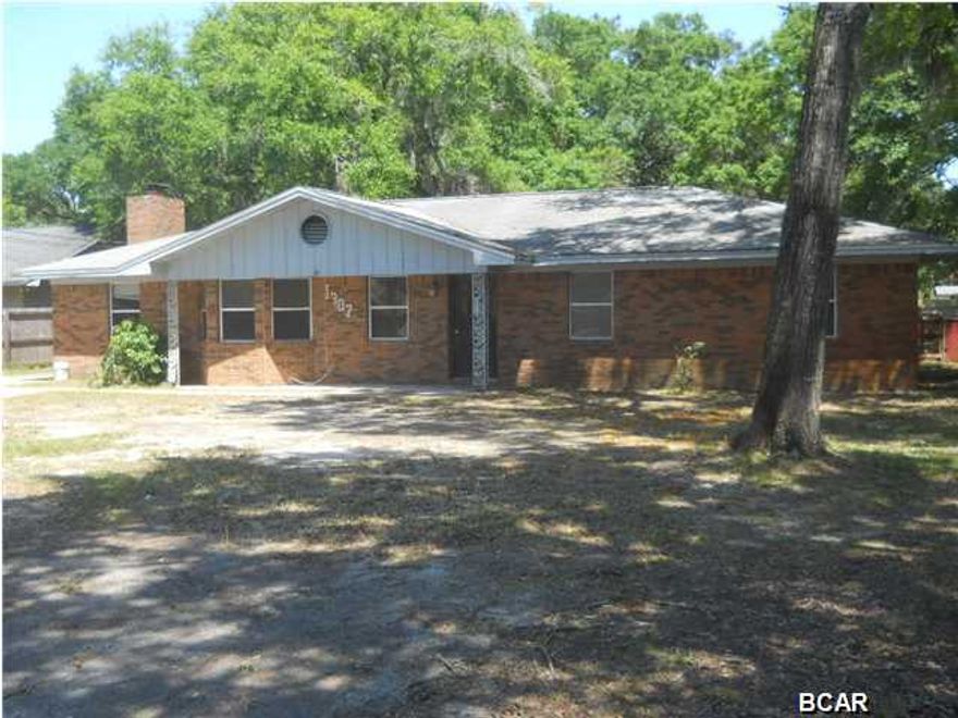 Located in a popular neighborhood, this 3 bedroom brick home is conveniently located to schools, shopping, entertainment, the bay and Lynn Haven's Park and Boat Ramp. Home sits on a large lot and features a screened porch, ceramic tile in kitchen, laundry room and bath and laminate floors in living area and bedrooms. This is a Fannie Mae HomePath property. All information is taken from public records. If important to buyer, please verify.