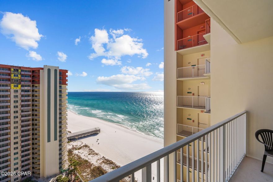 This updated beachfront condo offers a smart and efficient layout with designated living, dining, and kitchen areas that maximize every square foot. Large sliding glass doors open to an oversized private balcony overlooking the Gulf Coast, where you can enjoy breathtaking coastal views and the soothing sound of waves from the 19th floor. Look below and take in views of the resort-style pool featuring tiki huts, a zero-entry design, palm trees, and plenty of lounge space. A private dock provides quick access over the white sand, placing your toes directly in the emerald waters. Additional amenities include an indoor pool, spa, fitness center, and high-level security with a private parking garage. The Shores of Panama complex is nearing completion of a cosmetic face-lift, adding future value to each unit. This property is ideal as a short- or long-term rental, primary residence, or second home for those seeking relaxation with flexibility. Sitting within a short distance to the pier, popular local restaurants, and everyday conveniences, this condo has proven to be a lucrative investment!