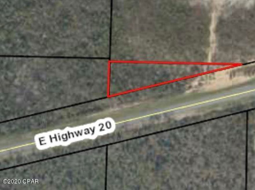 Natural, unimproved property fronted by Hwy 20 with Water Management land all around it, just off pristine Econfina Creek. 1.5 Acres, a little slice of paradise-- Could be used as commercial, residential, or just a getaway spot to enjoy the woods of Northern Bay County.  Priced to sell, call today.