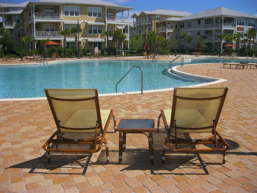 For rent! Gorgeous 2 BR, 2.5 BA condo at Island Reserve in the heart of Panama City Beach! This executive style condo features 10' ceilings throughout, wood flooring, stainless appliances and an open floor plan great for entertaining. The kitchen includes all appliances, granite counters and plenty of cabinet space. It overlooks the dining and living room area with french door access to the balcony. Split floor plan with both master suites having access to the balcony! The first master has a soaking tub, stand up shower and private toilet room. The second master has a large stand up shower and custom cabinetry. Washer/Dryer included; Island Reserve amenities include a resort style pool, clubhouse, indoor basketball court, exercise room, and beautifully landscaped court yard.