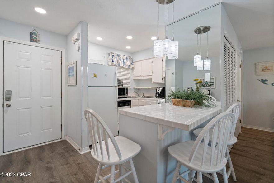 *CURRENTLY UNDER CONTRACT, SELLER WILL CONSIDER BACKUP OFFERS*An Investor's dream come true!! This charming beach condo is located in the highly sought after gated community, Gulf Highlands Beach Resort. This downstairs, easy access, condo, is being sold fully furnished, equipped, and is turn key ready for you and your family or special guests. The unit comfortably sleeps 4, offers a brand new stove, has been freshly painted, comes with a smart TV, as well as a stack-able washer and dryer! New windows and sliding patio door were recently installed. The roof was replaced three years ago and is in excellent condition. Whether you want to live here part time or full time, or use it as a short term/long term rental, this property offers just about everything you could ever want or need while while enjoying your stay! The community has exclusive, private beach access, 11 pools (5 heated), tennis & pickle ball courts, shuffle board courts, 18 hole mini golf course, playgrounds, exercise room, and much, much more! Drive your golf cart over to the private beach/club house and enjoy watching the sunrise or sunset on the upstairs deck, overlooking the Gulf of Mexico. Centrally located to great shopping and restaurants, in addition to Shipwreck Island Water Park, Just Jump, The Panama City Beach Pier, Publix grocery store, and much more! This truly is a unique opportunity and would make a great investment property! Rental projections are available by request. This condo won't last long! Call today to schedule your showing appointment!!