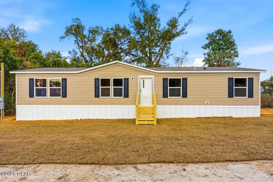 Brand-new double-wide manufactured home in the heart of Panama City! Stunning new 28' x 56' double-wide offering modern design, spacious living, and low-maintenance ownership on a private city lot.
This beautiful new home features an open-concept floor plan with a large living area, contemporary kitchen, and dining space perfect for entertaining. The kitchen is equipped with stylish cabinetry, ample counter space, and new appliances, making it both functional and inviting. The split-bedroom layout provides privacy, with a generous primary suite that includes a walk-in closet and a private bathroom.
Built to today's standards, this home offers energy-efficient construction, modern finishes, and durable materials throughout. The home is set on a .30-acre lot with city water and sewer — no lot rent and no HOA.
Located just minutes from downtown Panama City, shopping, schools, and the beaches, this property is ideal for homeowners, retirees, or investors looking for a move-in-ready, low-maintenance property.
New home. New systems. No deferred maintenance.
Just bring your furniture and enjoy worry-free living.