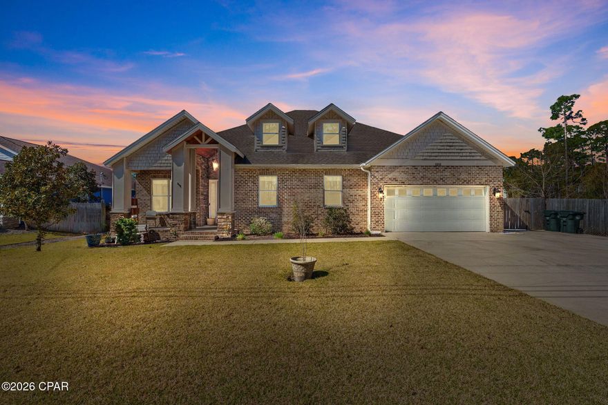 Beautiful custom built Craftsman style home overlooking the bayou, offering the perfect blend of luxury, function, and privacy. This thoughtfully designed home features Viking appliances, quartz countertops, a propane cooktop, tankless water heater, and a whole house sound system for seamless entertaining. The spacious living room showcases impressive 12 foot ceilings and an electric fireplace for added ambiance.

The primary suite is a true retreat with a spa style shower and tub combination, television integrated behind the bathroom mirror, and two walk in closets, including a hidden safe room concealed by a custom bookcase.

Recent updates include painted cabinets in 2020, a newly sodded backyard, UV air purification system in the AC, new dishwasher, and the addition of a wine or beverage cooler. The entire garage now offers expanded attic storage for exceptional functionality.

Enjoy outdoor living with a screened in back porch, added patio pavers, full irrigation in both the front and back yard, a fully fenced yard, and a separate fenced side yard ideal for gardening, pets, or extra storage. A 200 gallon propane tank is conveniently located in the backyard to support the home's gas features.

Additional highlights include a Nest thermostat, wiring for a generator, potential RV or boat parking, and no neighbors on the right side providing added privacy. Located with no HOA, this property combines peaceful waterfront living with modern conveniences in a beautifully maintained setting.