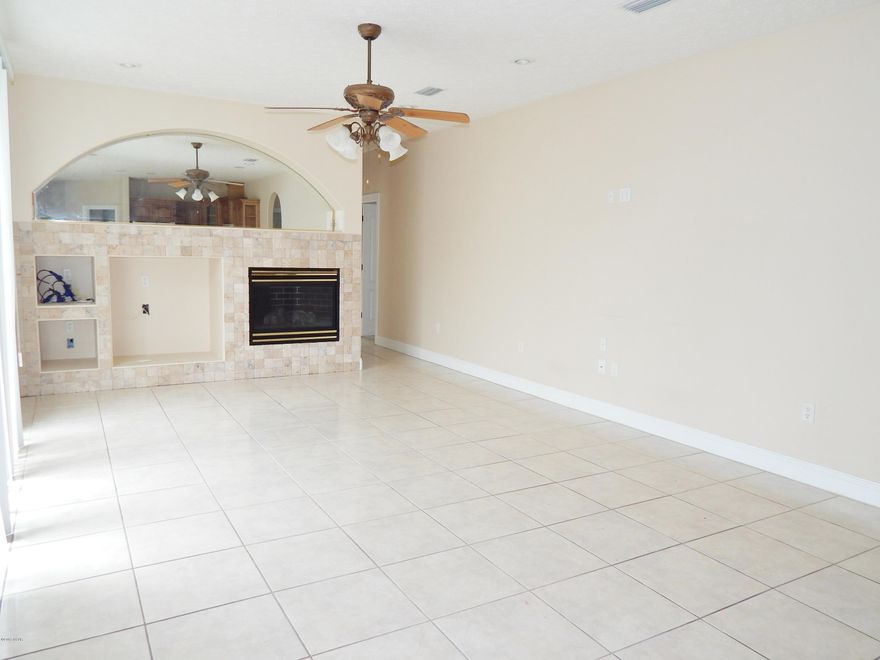 Great home in desirable Hammocks community. Looking for a great home with plenty of space? Check out this 4 bedroom, 3 bath home with over 2200 sqft. Home offers a split bedroom floor plan and master suite off of formal living and dining area. The family room is open to the kitchen and has gorgeous built ins and a fireplace. This home is already set up perfectly for those desiring to add a private pool in the back yard with sliding glass doors off the master, formal living area, and family room. The additional bath is located across from one of the add bedrooms and has an outside door that leads to the back yard. The rooms are large and have plenty of closet space.  Call your Realtor today to see this GREAT home. Note: There is a .5% community fee charged to the buyer upon closing. The fireplace is hooked up to a propane tank.