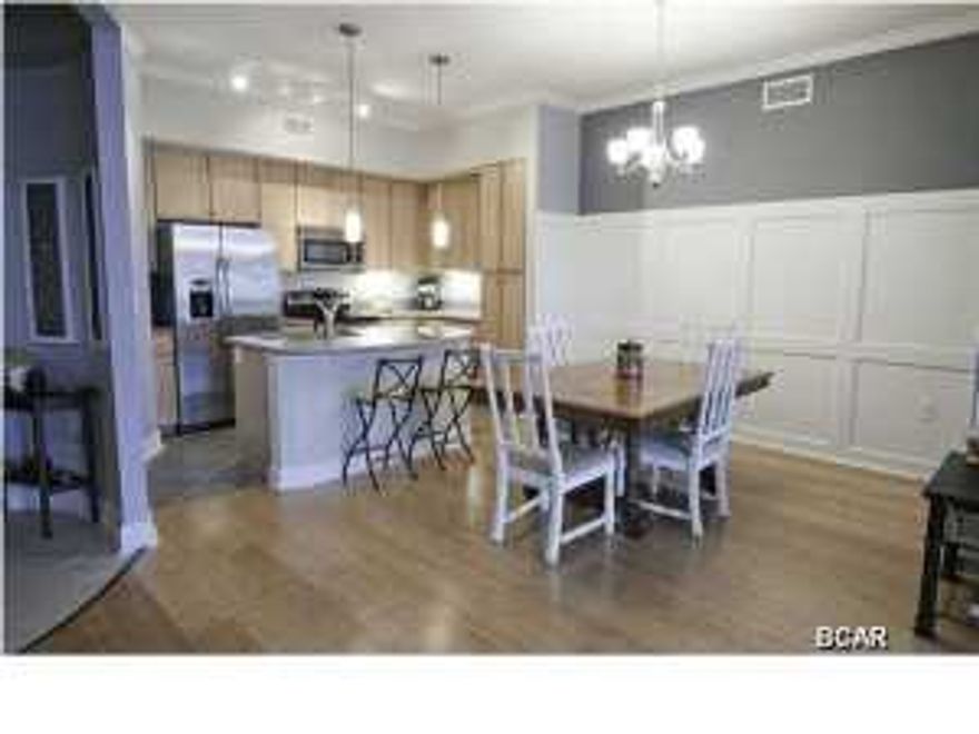 Beautiful 3rd floor, 2 bedroom 2 1/2 bath home. The kitchen feature stainless appliances, Fridge with ice maker, granite counter tops, kitchen Isle and tile floors. This split floor plan with two master bedrooms has plenty of room at approx. 1325sq. ft. The front door is coded combo. entry for convenience/security. The bamboo flooring in the dining/living room is very nice. The facilities are very nice with an indoor basketball court, 24 Hr. access to the fitness equipment, gated , and a fabulous pool with near 1 acre surface area, and zero entry with waterfalls. Comes with a upscale full sized G.E. washer/dryer. This unit is in fantastic condition and is being offered unfurnished. Call today, don't let this one slip away.