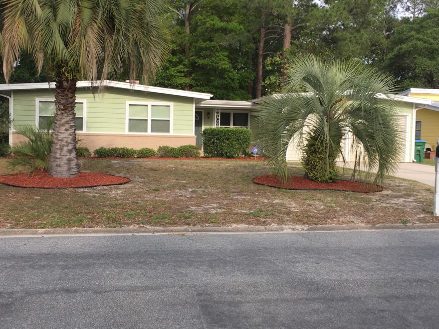 Great home in Woodlawn.  New windows.  Hot tub.  Enclosed sunroom. Huge garage