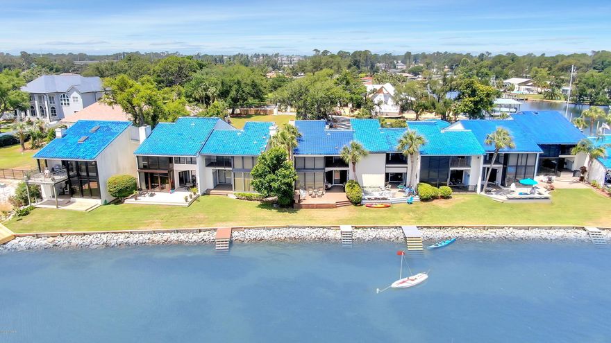 Million-dollar view, without the million-dollar price tag! Enjoy the expansive water view of St. Andrews Bay, as well as great views of the Hathaway Bridge in this attractive 2 bedroom, 2.5 bath townhome. Easy access to Highway 98, which takes you to the beach or town. THE SELLER IS IN THE PROCESS OF ACQUIRING A DESIGNATED BOAT SLIP FOR THIS PROPERTY.