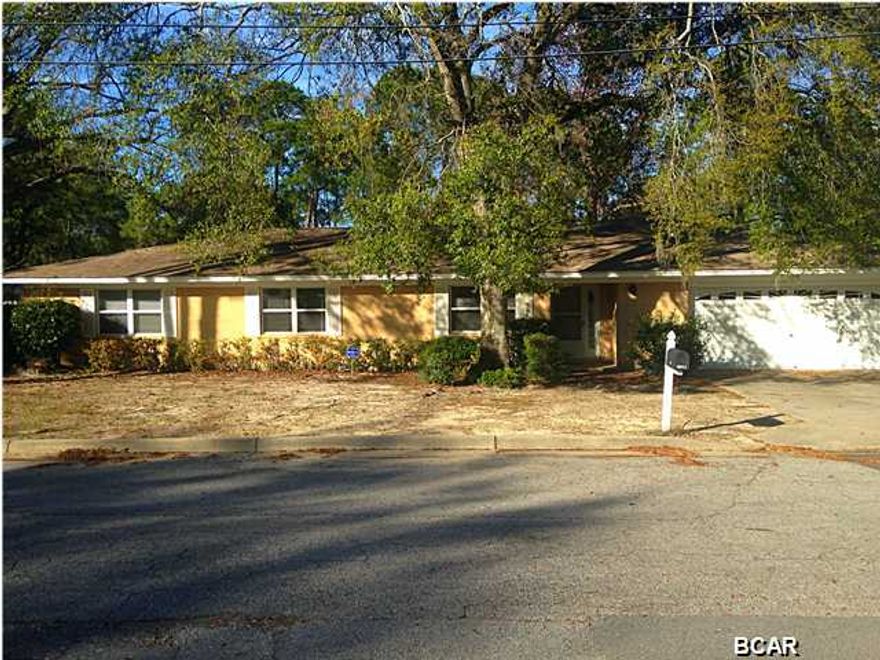 Lovely renovated home located in the very desireable Garden Club area. Just 1 block from the bay and located on Johnson Bayou, this 4 bedroom, 2 1/2 bath home includes large renovated kitchen with an island/bar, eat-in area, new cabinets, new stove and oven, new sink, granite countertops, new tile backsplash,new pendant lights, new tile floors, large walk-in pantry, small den/sitting area, newly renovated 1/2 bath, and french doors that lead to sunroom and back deck. Just off the kitchen area is a large living and dining room with new wood floors. All bedrooms have wood floors and all baths have granite counters. The master bedroom offers a view of the bayou and the attached master bath is beautiful with a large jacuzzi tub, separate large shower, and beautiful ceiling detail. Off