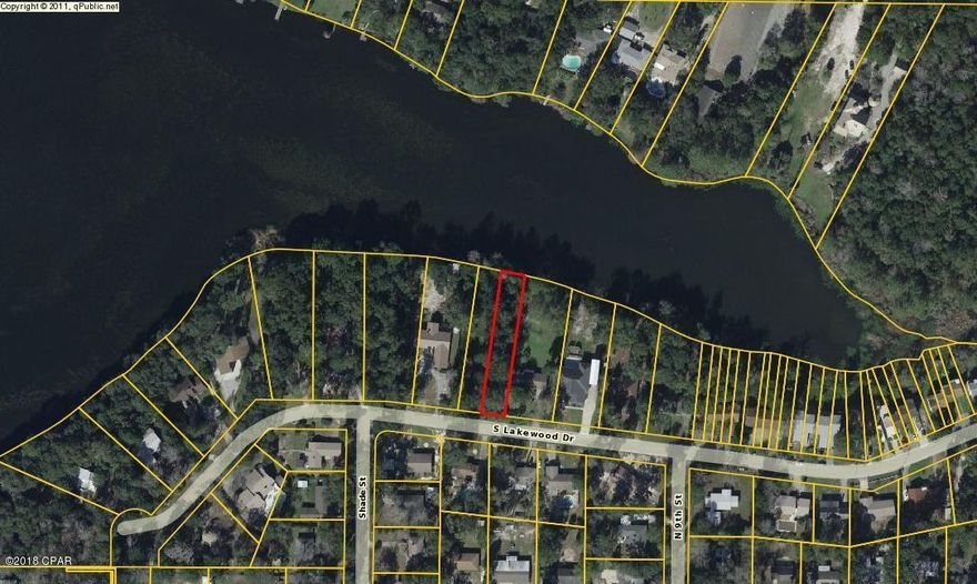 Waterfront lot on Lake Martin. Build your dream home on the waterfront lot that slopes gently down to the shoreline. The lot has many beautiful Magnolia and Oak trees. Please note that 4819 Lakewood Drive S is also available MLS# 667950.