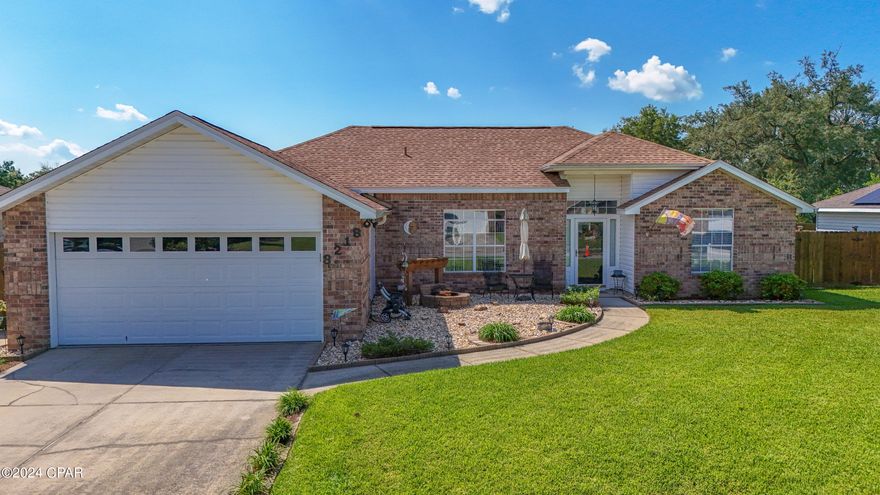 CURRENTLY UNDER CONTRACT, SELLER WILL CONSIDER BACKUP OFFERS.  POOL HOME!!!  Welcome home to Highway 22 West Estates! This well-maintained home has so much to offer and is completely move-in ready! The kitchen has been updated with beautiful granite countertops, custom cabinets with soft close drawers, a custom silverware drawer with upper and lower sections, a cabinet with built in storage for cutting boards and baking sheets, all stainless steel appliances, as well as a deep double sink. The living room has a wood-looking tile that makes cleaning a breeze. The built-in electric fireplace will keep you warm during those chilly Florida winters. All 3 bedrooms have thick, well-maintained carpet and walk-in closets with double walk-in closets in the master bedroom. The master bath is upgraded with granite countertops, tiled wood-looking floors, a double vanity with lots of storage, and a double tiled shower with a glass door as well as a linen closet for extra storage. The wall mounted Tv's in the master bedroom and bedroom 2 will be included as well as the surround sound speakers mounted in the dining room. While the interior of the home is immaculate, the outside is the real star! As you enter the backyard, you will see a 14x28, 6 foot deep in-ground saltwater pool with a freshly painted pool deck and a sheer decent waterfall feature. The covered patio has plenty of room for outdoor furniture to have a relaxing entertainment area. To the left of the backyard is a large 20x24 workshop with a 7'6'' garage door for extra parking or boat parking and plenty of storage for pool toys! This workshop has been highly insulated in blown in insulation. The pool equipment has been wired into a sub panel in the workshop as well. To the right of the backyard is a fenced in section perfect for pets to have a blocked off section from the rest of the backyard. There is also a deck, behind the pool, with a pergola that hosts a beautiful gas firepit. The landscaping of the entire property is stunning and has won the City of Callaway ''Lawn of the month'' in 2024. The home has a shallow well with 5 active zones for irrigation. The roof was replaced in 2018, the electric water heater was replaced in 2021, the HVAC was replaced in 2020.  Additional features include: Soundbar in dining room remains, 10x15 free standing covered porch, tile through main living areas with carpet in bedrooms, incredible landscaping, and so much more.  Only 19 minutes from Tyndall Airforce base. If you are looking for a move-in ready home that is perfect for entertaining, this is the home for you. Age, sq.ft., room dimensions, schools, taxes, or any important information to the buyer must be verified via a personal or professional inspection.