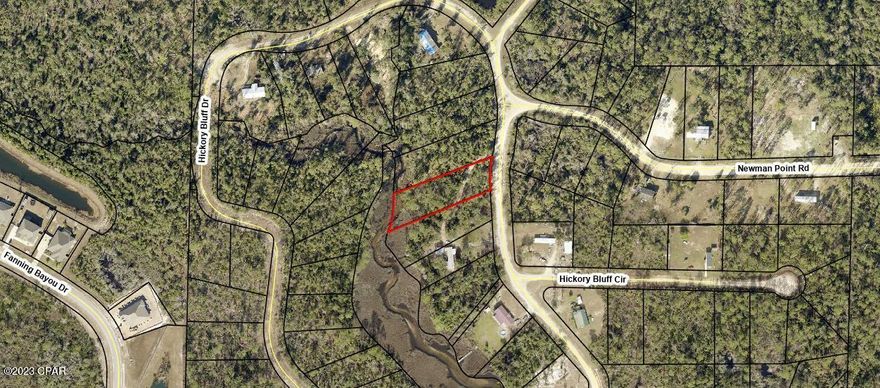 Lot 23 A Hickory Bluff, named for the trees and high and dry land, here is a building lot, ready for a new construction or mobile home. Surrounded by new homes and a short distance to Fanning Bayou, fishing, boat ramp and just a few miles from Lynn Haven. The lot has with no association fees so bring your boat, RV, build a pole bar or workshop. Peaceful, quiet and ready to go today! Lot next door is for sale as well or choose from any of the 50 lots we have for sale in Hickory Bluff community! Call for additional details.