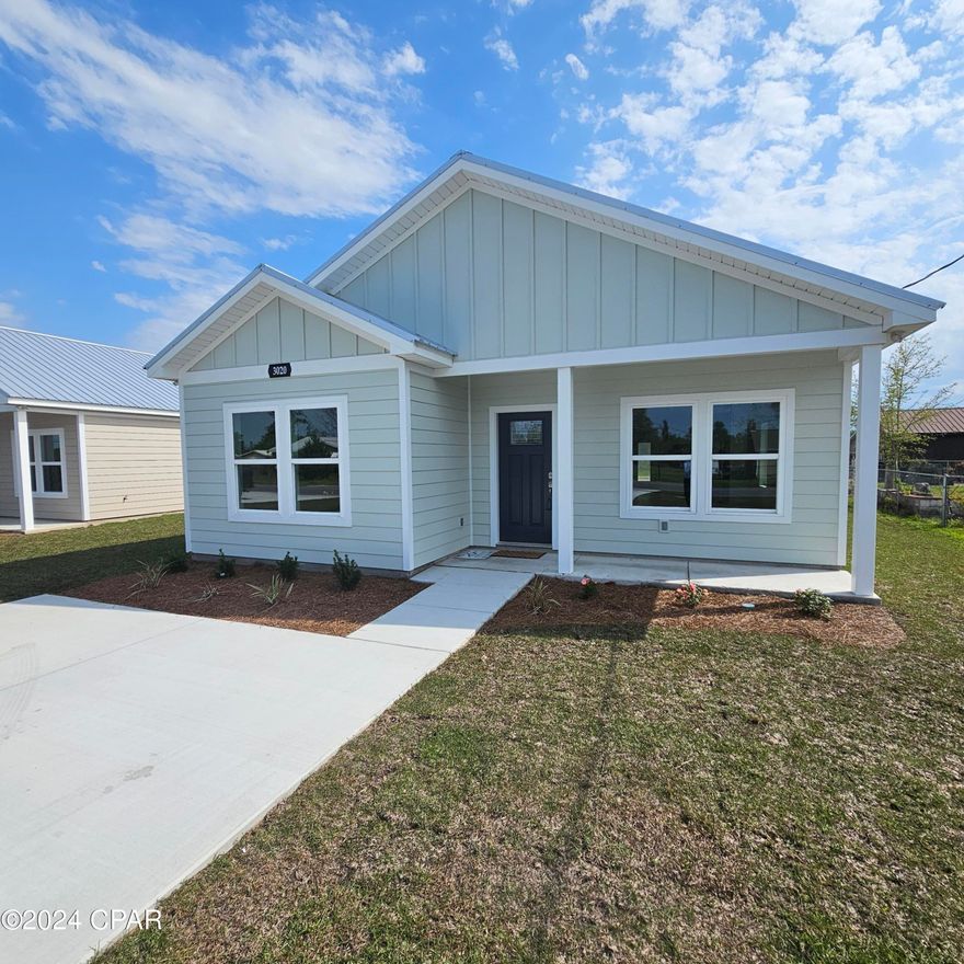 Offering 5,000.00 to buyers' closing costs or 5,000.00 towards privacy fence!!! New Construction in the heart of Panama City! Builder spared no expense when designing... 2x6 exterior walls for more insulation, spray foam insulation in attic, and a metal roof. James Hardie fiber cement siding. This is a spacious floor plan that is bright and airy with plenty of natural light. 9' ceilings, craftsman trim and luxury vinyl plank throughout. No carpet. Beautiful, recessed lighting. Amazing kitchen featuring custom all-wood cabinets, white quartz counter tops, subway backsplash, and a complete stainless steel appliance package. Large island with storage and a breakfast bar. Walk-in pantry. Split floor plan. Spacious master suite has double vanities with quartz tops and built-in cabinets. Walk in-closet. Guest rooms are nice sized. There is a great space to be used as a mud room when coming in the back door, right next to the laundry room. Covered back patio with utility room for storage. Pre-wired with a panel to power a detached workshop or pool. Home should be incredibly energy efficient with all the insulation upgrades. City utilities and located in Flood Zone X, so flood insurance is not required. No HOA. Lot is 50x190 giving you a very spacious backyard. Sprinkler system. Quality of construction is on display from the moment you arrive. Construction is complete and ready to call home. Excellent proximity to shopping and restaurants. Less than 20 minutes to Tyndall Air Force Base. Schedule your visit today.