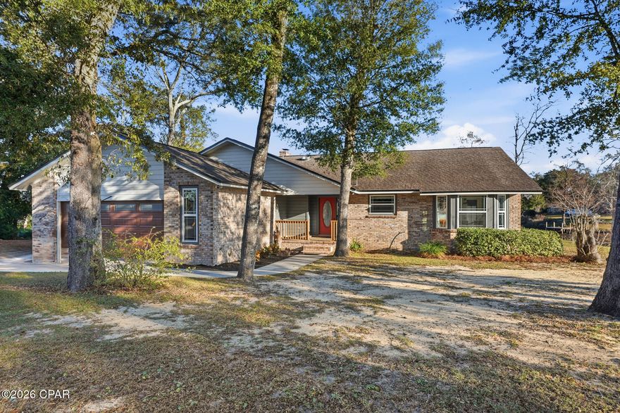 Boater's Paradise on Deer Point Lake!
Welcome to 7248 W. Lakeland Drive, a rare waterfront gem offering approximately 250 feet of water frontage along the side and rear of the property. Ideally situated on a canal, this home captures stunning views of the expansive, deep waters of Deer Point Lake and delivers the ultimate Florida waterfront lifestyle.

With direct water access, this property is perfect for boating, fishing, kayaking, and lakefront living right from your backyard. The surrounding water front provides ample depth for boating, allowing easy access to the deep waters of Deer Point Lake, an ideal setup for avid boaters and water enthusiasts.

Nestled in a quiet, established neighborhood, the home offers a peaceful setting while remaining conveniently close to shopping, dining, schools, and Tyndall Air Force Base. Inside, the functional, light filled floor plan features rich Brazilian cherry hardwood flooring, a cozy fireplace, and an oversized screened in porch overlooking the water, perfect for relaxing and entertaining, as well as a side porch.

In addition to the three bedrooms, the home includes a versatile 12' x 12' bonus room that offers a plethora of possibilities. This flexible space can easily be used as a fourth bedroom, home office, exercise room, hobby space, or guest retreat, allowing you to tailor the home to your lifestyle needs.

Outdoors, the expansive waterfront yard offers endless possibilities, including ample space for a swimming pool, outdoor entertaining areas, additional outbuildings, or simply relaxing while taking in the breathtaking lake views and unforgettable sunsets.

Whether you're searching for a full time residence, a weekend retreat, or a long term investment, this exceptional Deer Point Lake property offers location, lifestyle, and remarkable water frontage, an excellent opportunity in Bay County, FL.

Schedule your private showing today and experience waterfront living at its finest.