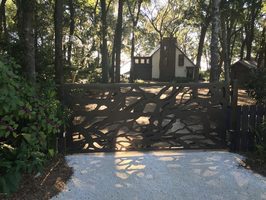 REDUCED TO SELL! This unique 4/3 custom Has a fantastic view of Deer Point Lake!  It has been totally remodeled and the kitchen has rare Braziian granite, all Viking apliances with six burner gas cooktop/oven. The open great room has a gas fireplace, open dining area, and gourmet kitchen w/ custom cabinets.  Ultra bathrooms w/ vessel sinks, lavish details and tile work. The media room/office can serve as a 4th bedroom.  Two lift boathouse, salt water pool, low maintenance and no grass!  Bay county offers Free Choice of schools as numbers allow.  Only 10 minutes to the dam on Hwy 2321 to put your boat into North Bay for saltwater fishing or take your boat out at dam  bridge from Deer Point lake and put in across street at saltwater landing. This home has been totally rewired, new interior doors, new engineered wood flooring with floating bamboo floor in large foyer entry, open great room/dining/kitchen new plank flooring. Custom large walk in closet in master plus new man closet with sliding doors. Galvanized metal roof on home and boathouse, new skylites and wood interior trim. Exterior wiring to pool and dock enclosed in coiled metal lines. Double garage, single garage, work shed/workshop and entry gate is custom iron with remotes. Upscale in every way!